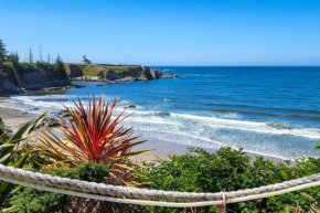 Oceanside Getaway with Beach Access and Home Gym!